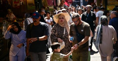 Tourists are seen in the famous Eminönü neighborhood, Istanbul, Türkiye, Aug. 22, 2025. (AA Photo)
