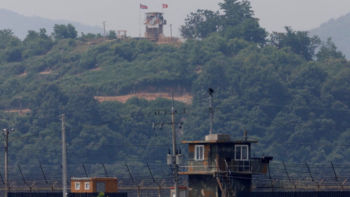 A North Korean soldier stands guard at his guard post inside North Korean territory, in this picture taken from Paju, South Korea, near the demilitarized zone (DMZ) separating the two Koreas, June 17, 2020. (Reuters Photo)