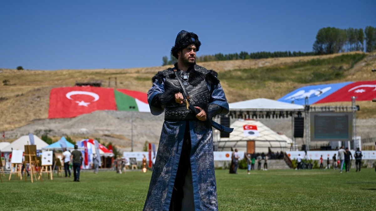 A man dressed in ancient Turkish military garb poses at the venue set up for anniversary events in Ahlat, Bitlis, Türkiye, Aug. 24, 2025. (AA Photo)