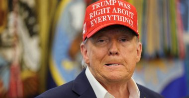 U.S. President Donald Trump wears a &quot;Trump Was Right About Everything!&quot; hat, as he makes an announcement on the 2026 FIFA World Cup, in the Oval Office at the White House, Washington, U.S., Aug. 22, 2025. (Reuters Photo)