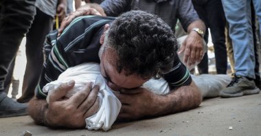 A Palestinian man mourns a loved one killed in an Israeli attack in Gaza, Palestine, Aug. 24, 2025. (AA Photo) 