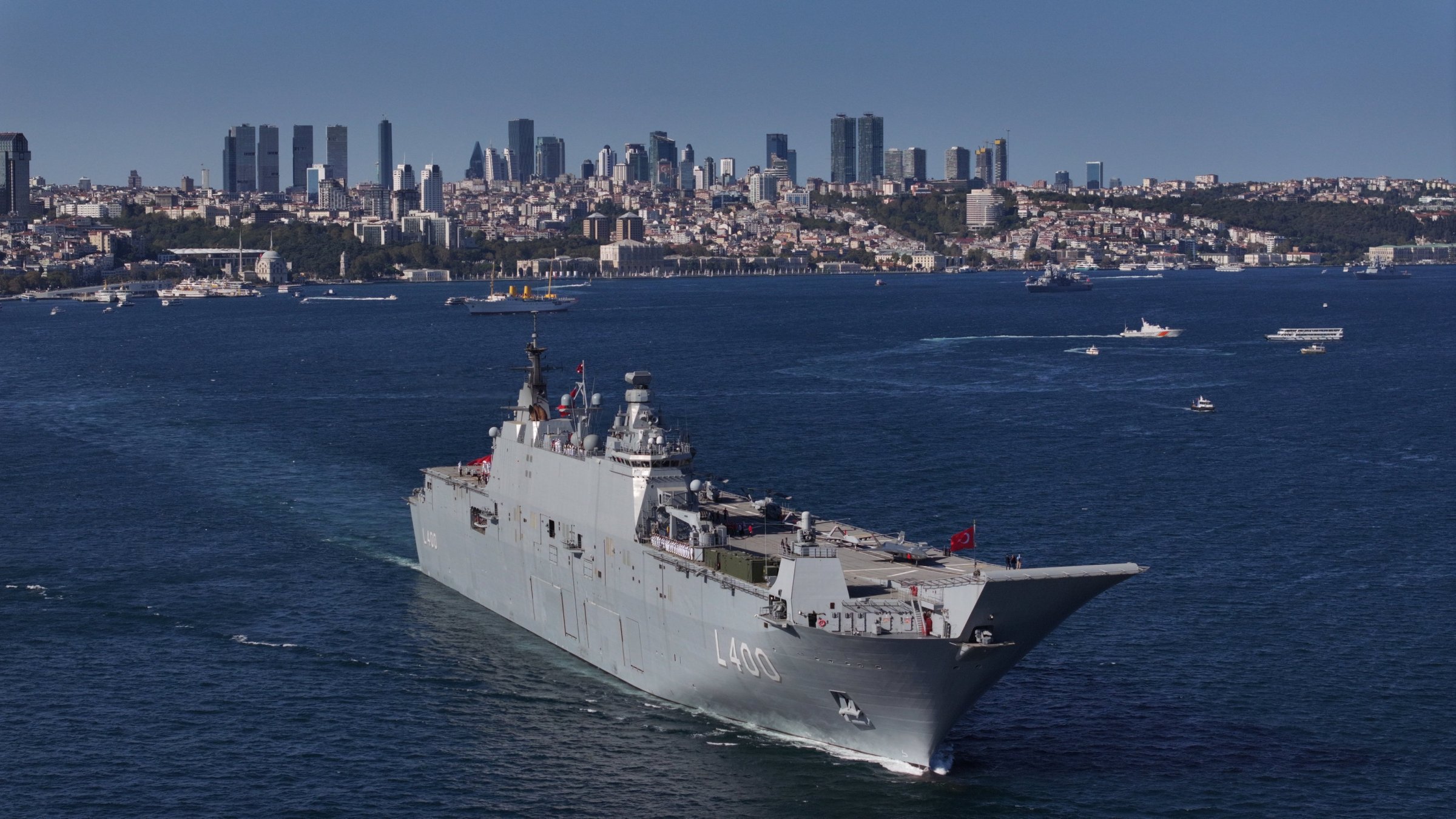 The TCG Anadolu amphibious assault ship sails through the Bosporus during a naval parade held as part of the Teknofest Blue Homeland event in Istanbul, Türkiye, Aug. 24, 2025. (AA Photo)