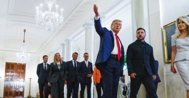 U.S. President Donald Trump (C) leads Ukraine’s President Volodymyr Zelenskyy (C-R) and European leaders in the Cross Hall of the White House, Washington, U.S., Aug. 18, 2025. (EPA Photo)