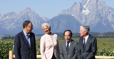 BoE Governor Andrew Bailey (L), ECB President Christine Lagarde, BoJ Governor Kazuo Ueda (2nd-R) and Fed Chair Jerome Powell (R) pose for a photo as they attend the 2025 Jackson Hole, Wyoming, U.S., Aug. 22, 2025. (Reuters Photo)