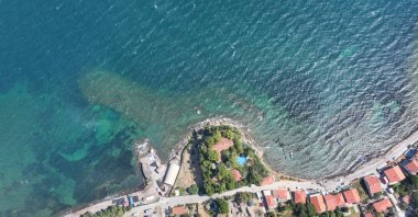 An aerial view of Liman Tepe along the Izmir coasts, where rising sea temperatures are increasingly affecting the surrounding marine environment, Izmir, Türkiye, Aug. 20, 2025. (AA Photo)