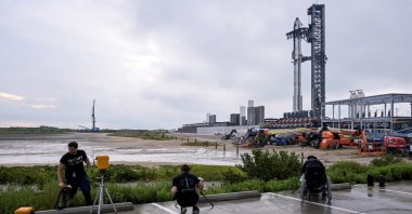 Photographers set up remote cameras for the upcoming SpaceX Starship launch on its 10th test flight at the company&#039;s complex, Starbase, Texas, U.S., Aug. 24, 2025. (Reuters Photo)