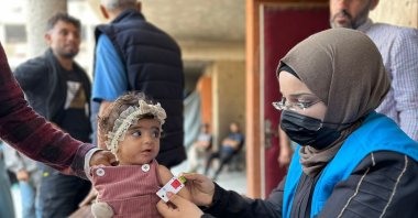 United Nations Relief and Works Agency (UNRWA) health staff screen children for malnutrition in UNRWA clinics, Gaza Strip, Palestine, July 2025. (Courtesy of UNRWA)