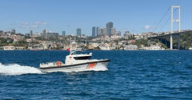 A Turkish coast guard vessel searches the Bosporus for a missing Russian swimmer in Istanbul, Türkiye, Aug. 25, 2025. (AA Photo)