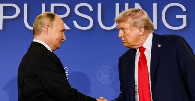 U.S. President Donald Trump and Russian President Vladimir Putin shake hands during a press conference following their meeting to negotiate an end to the war in Ukraine, at Joint Base Elmendorf-Richardson, in Anchorage, Alaska, U.S., Aug. 15, 2025. (Reuters File Photo)
