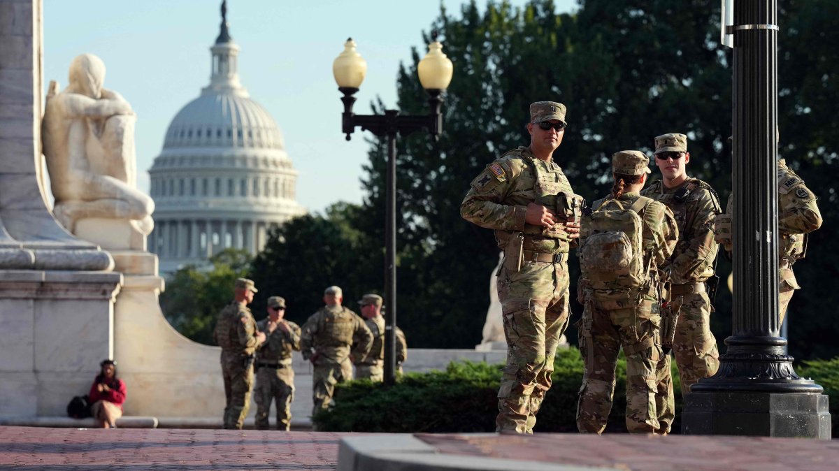 Members of the National Guard armed with sidearms patrol Union Station, Washington, D.C., U.S., Aug. 25, 2025. (AFP Photo)