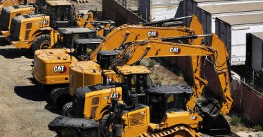 Caterpillar equipment sits parked in a lot, San Leandro, California, U.S., Aug. 5, 2025. (AFP Photo)