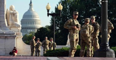 Members of the National Guard armed with sidearms patrol Union Station, Washington, D.C., U.S., Aug. 25, 2025. (AFP Photo)