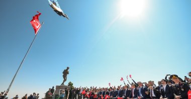 Turkish Air Force aerobatic team SOLOTÜRK performs a flyover as Parliament Speaker Numan Kurtulmuş and dignitaries attend a ceremony marking the 103rd anniversary of the Great Offensive at the Mustafa Kemal Monument, Kocatepe, Afyonkarahisar, Türkiye, Aug. 26, 2025. (AA Photo)