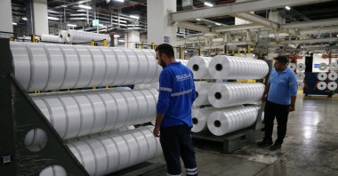 Sasa Polyester workers are seen in a company&#039;s facility at an undisclosed location, Aug. 26, 2025. (AA Photo)