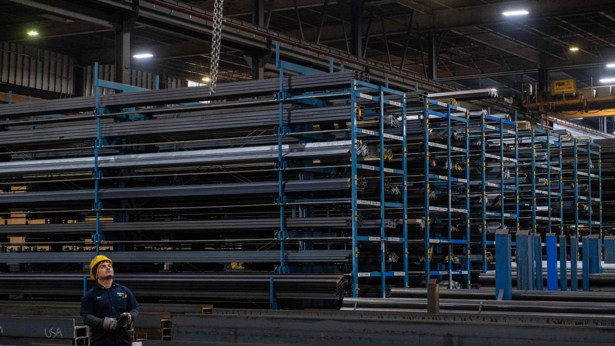 A worker moves a crane to lift a steel beam at Central Steel Supply Company, Marlborough, Massachusetts, U.S., March 13, 2025. (AFP Photo)