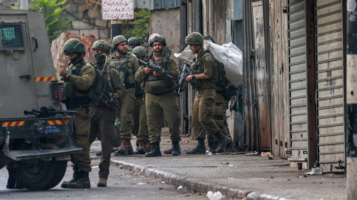 Israeli troops conduct a raid in Nablus city in the occupied West Bank, Palestine, Aug. 27, 2025. (AFP Photo)