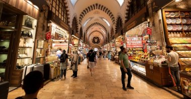 People shop at the historic Grand Bazaar in Istanbul, Türkiye, July 4, 2022. (Shutterstock Photo)