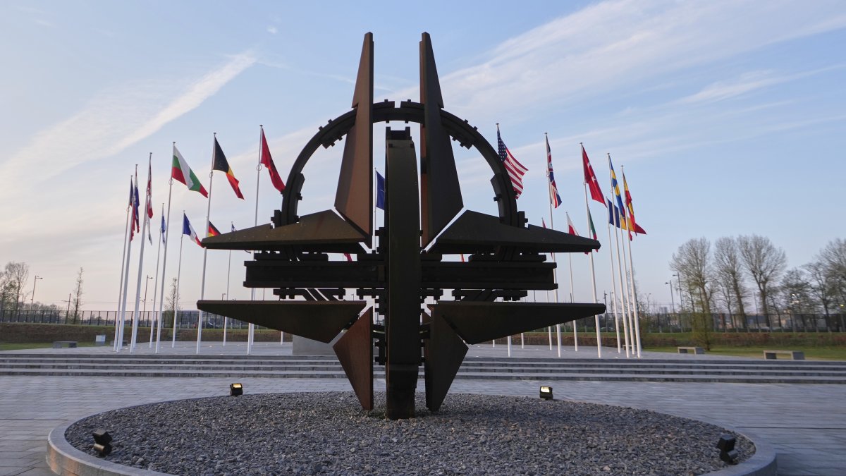 Flags of Alliance members flap in the wind prior to a meeting of NATO foreign ministers at NATO headquarters in Brussels, Belgium, April 3, 2025. (AP Photo)