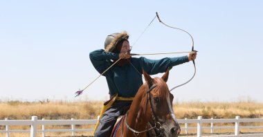 Zeynep Cansu Ertürk, 17, competes in a horseback archery contest during ceremonies marking the 954th anniversary of the Battle of Malazgirt, Malazgirt, Muş, Türkiye, Aug. 26, 2025. (AA Photo)