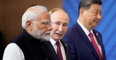 Indian Prime Minister Narendra Modi (L), Russian President Vladimir Putin (C) and Chinese President Xi Jinping attend a family photo ceremony prior to the BRICS Summit plenary session, Kazan, Russia, Oct. 23, 2024. (Reuters Photo)