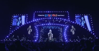 Renowned Turkish singer Derya Uluğ performs at the Türkiye Culture Route Festival in Erzurum, Türkiye, Aug. 22, 2025. (İHA Photo)