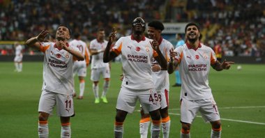 Yunus Akgün (L) and Victor Osimhen (C) join Eren Elmalı after he scored Galatasaray&#039;s first goal against Zecorner Kayserispor during the third-week tie of the Trendyol Süper Lig, Kayseri, Türkiye, Aug. 24, 2025. (AA Photo)