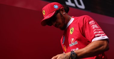 Ferrari driver Lewis Hamilton walks at the paddock before the third practice session for the Formula One Hungarian Grand Prix at the Hungaroring racetrack in Mogyorod, Budapest, Hungary, Aug. 2, 2025. (EPA Photo)