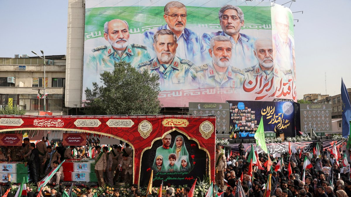 People attend the funeral procession of Iranian military commanders, nuclear scientists and others killed in Israeli strikes, in Tehran, Iran, June 28, 2025. (Reuters Photo)