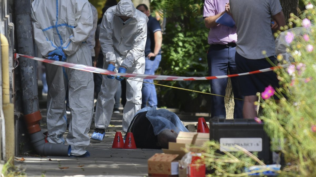 Ukrainian forensic experts work at the scene of a shooting that killed former parliament speaker Andriy Parubiy in western Lviv, Ukraine, Aug. 30, 2025. (EPA Photo)