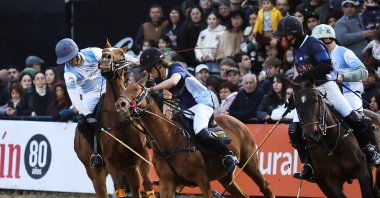Juan Falabella and Lucas Goti battle for the ball during a polo exhibition match at the Rural Society annual exhibition, in Buenos Aires, Argentina July 27, 2025. (Reuters Photo)
