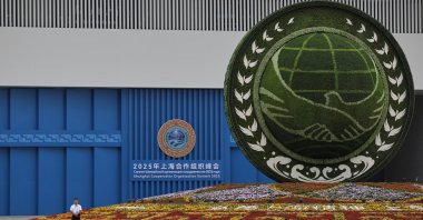 A member of staff stands guard outside of the Tianjin Meijian Convention and Exhibition Center, a venue of the Shanghai Cooperation Organization (SCO) Summit 2025 in Tianjin, China, Aug. 30, 2025. (EPA Photo)