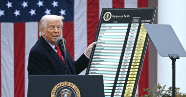 U.S. President Donald Trump holds a chart as he delivers remarks on reciprocal tariffs during an event in the Rose Garden entitled &quot;Make America Wealthy Again&quot; at the White House, Washington, D.C., U.S., April 2, 2025. (AFP Photo)