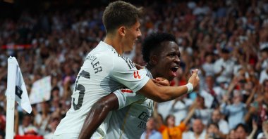 Real Madrid&#039;s Vinicius Junior celebrates scoring their second goal with Arda Güler, during a La Liga match against Mallorca, Madrid, Spain, Aug. 30, 2025. (Reuters Photo)