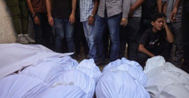 Palestinians mourn by the shrouded bodies of relatives killed in Israeli strikes on Gaza City the previous night, at al-Shifa hospital, Gaza Strip, Palestine, Sept. 1, 2025. (AFP Photo)