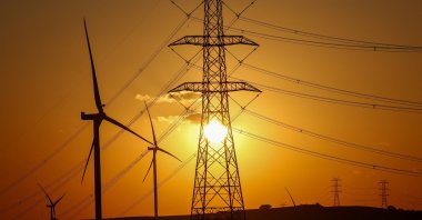 The sun sets behind wind turbines in Silivri near Istanbul, Türkiye, Aug. 16, 2025. (Reuters Photo)