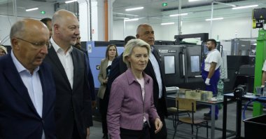 European Commission President Ursula von der Leyen, Bulgarian Prime Minister Rosen Zhelyazkov, and Boyko Borissov, leader of GERB party, walk during a visit to Bulgarian state arms company VMZ-Sopot, in Sopot, Bulgaria Aug.31, 2025. (Reuters Photo)