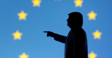 A 3D-printed miniature model depicting U.S. President Donald Trump and European Union flag in this illustration taken,  April 17, 2025. (Reuters File Photo)