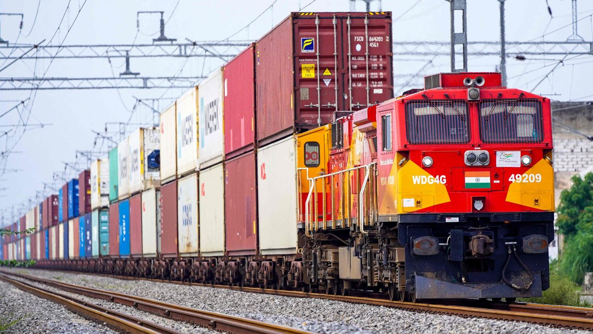 A freight train carrying cargo containers rides along a railway track, Ajmer, India, Aug. 26, 2025. (AFP Photo)