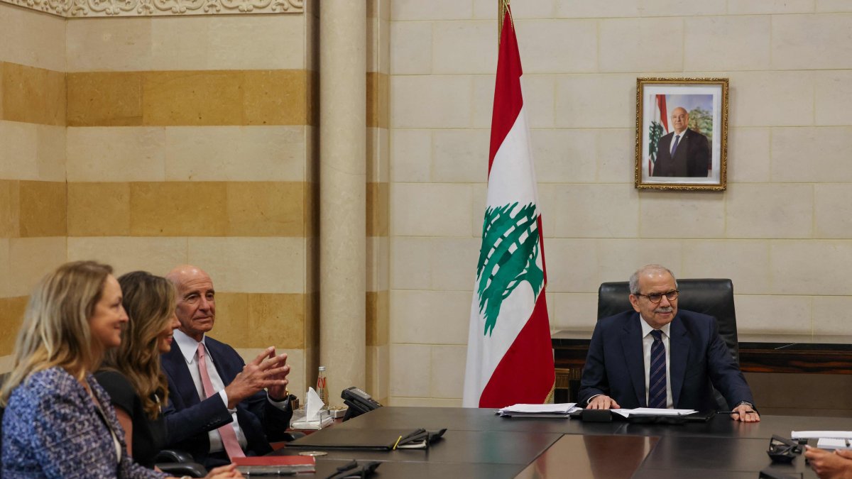 Lebanon&#039;s Prime Minister Nawaf Salam (R) holds a meeting with U.S. Ambassador to Türkiye and special envoy for Syria Tom Barrack (C), Beirut, Lebanon, Aug. 18, 2025. (Photo AFP)