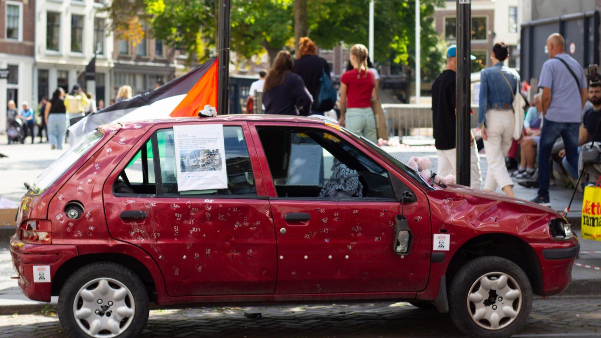 A vehicle representing 5-year-old Hind Rajab and her family, who were killed during an Israeli army attack, was exhibited in the Netherlands, Aug. 30, 2025. (AA Photo)