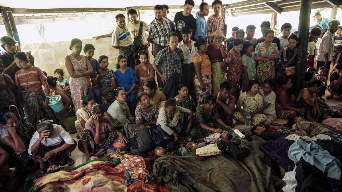 Mourners react during a funeral for the victims of a bombardment carried out by Myanmar&#039;s military in Mrauk U, Rakhine State, Myanmar, Aug. 26, 2025. (AFP Photo)