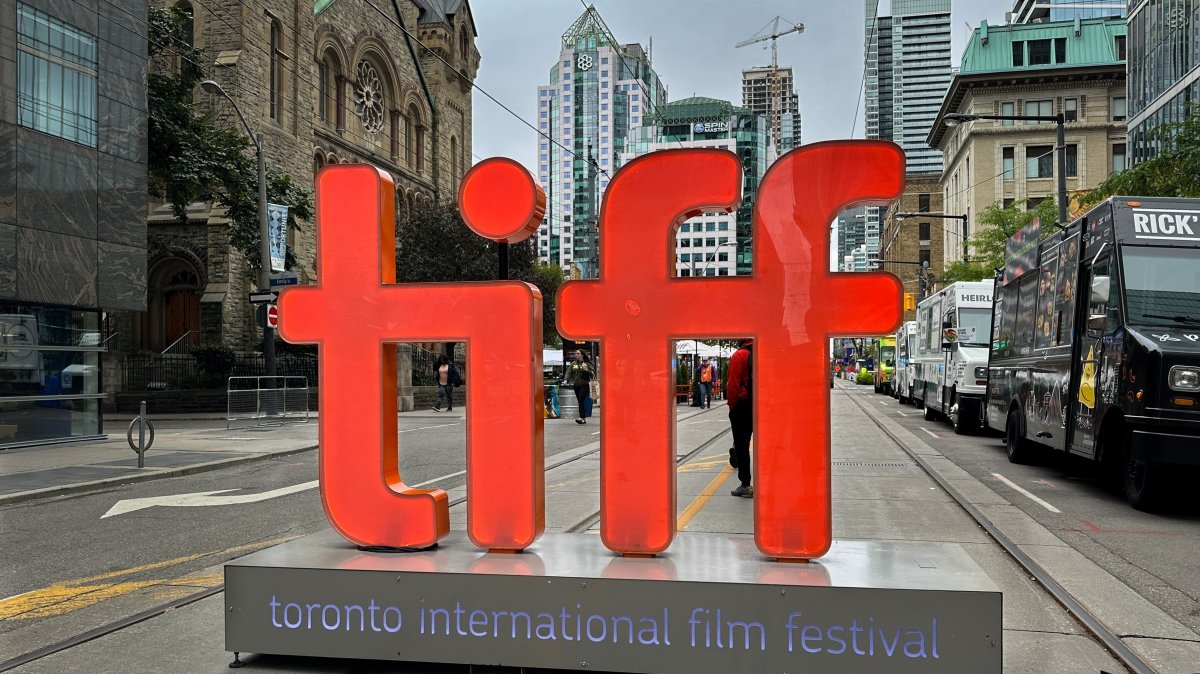 A large backlit “tiff” sign signals the entrance to the pedestrian only street festival in honor of the Toronto International Film Festival, Toronto, Canada, Sept. 9, 2023. (Shutterstock Photo)