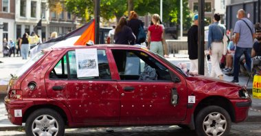 A vehicle representing 5-year-old Hind Rajab and her family, who were killed during an Israeli army attack, was exhibited in the Netherlands, Aug. 30, 2025. (AA Photo)
