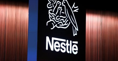 The Nestle logo is seen during the opening of the 151st Annual General Meeting of Nestle, Lausanne, Switzerland, April 12, 2018. (Reuters Photo)