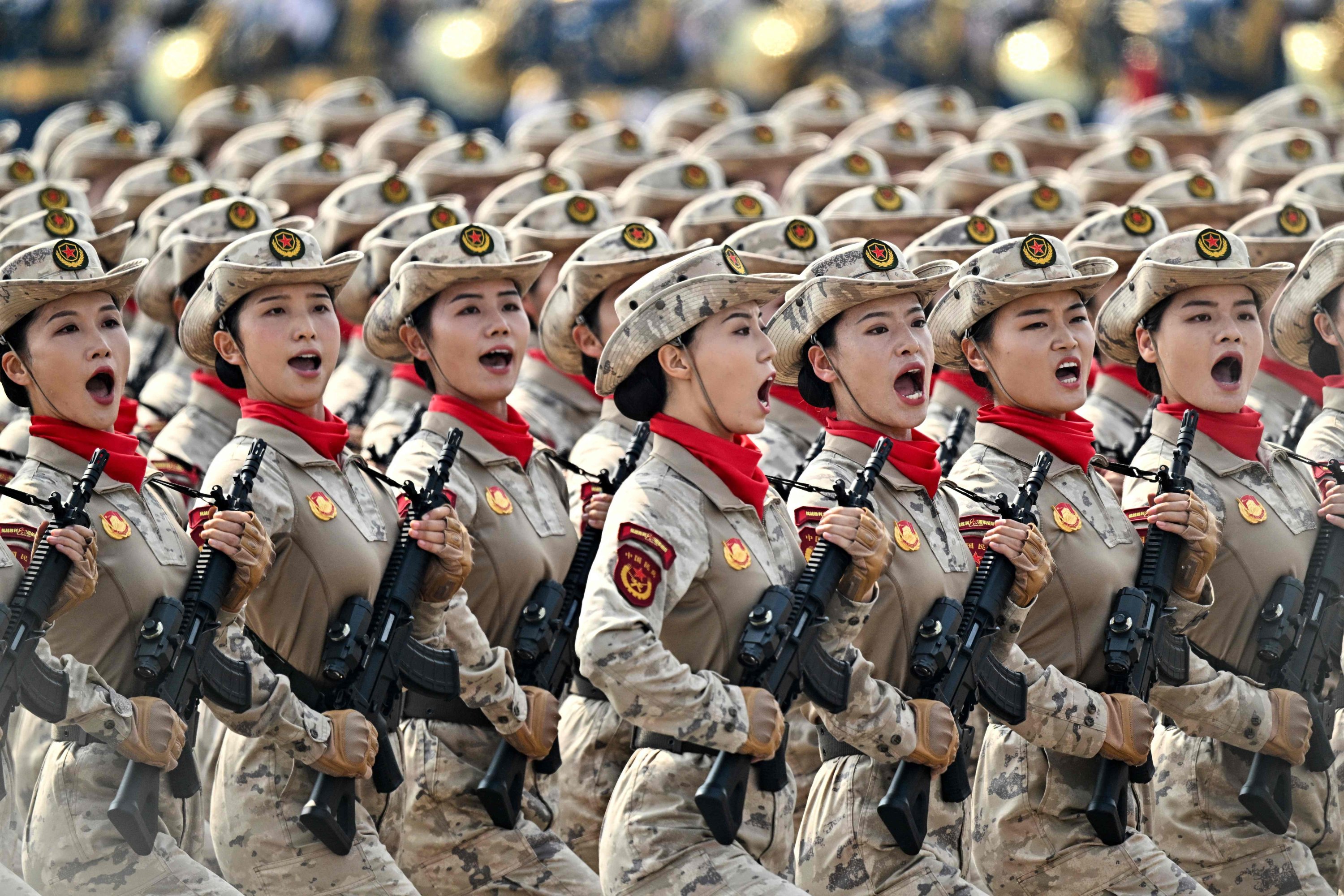 China flexes military muscle in parade with drones, missiles, lasers