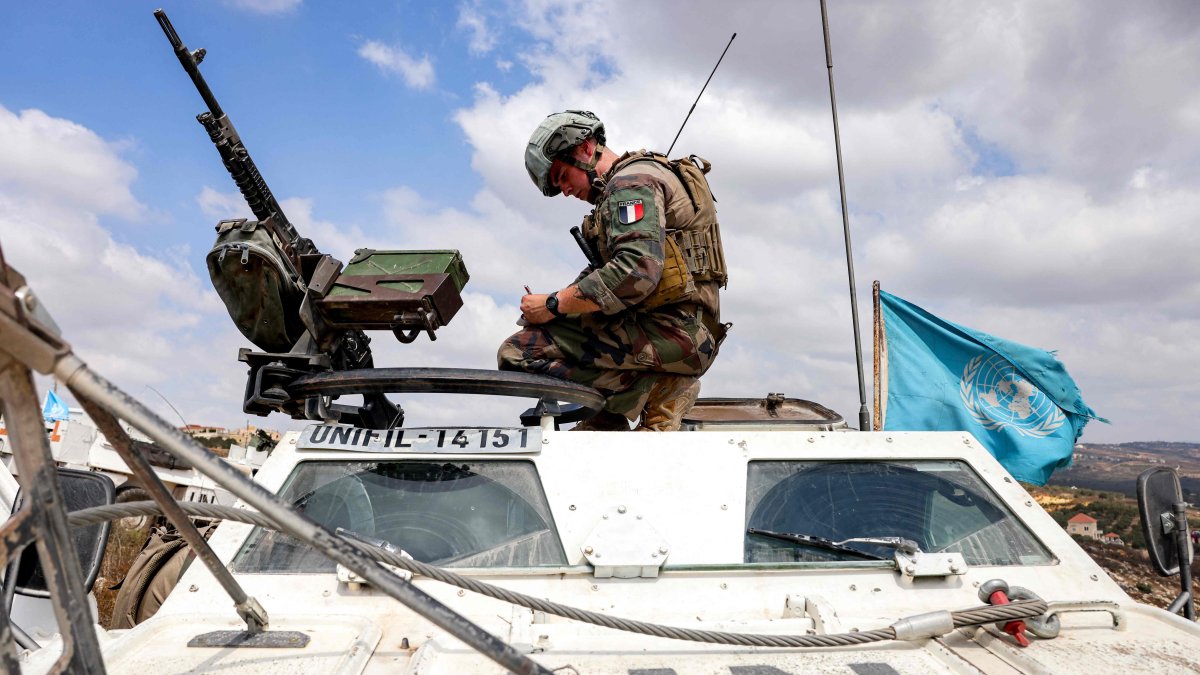 A French peacekeeper of the UNIFIL sits atop an armored vehicle during a patrol in southern Lebanon, Aug. 27, 2025. (AFP Photo)