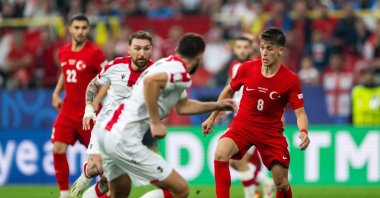 Türkiye&#039;s Arda Güler (R) in action during the UEFA EURO 2024 group stage match against Georgia at the Football Stadium Dortmund, Dortmund, Germany, June 18, 2024. (Getty Images Photo)