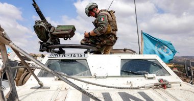 A French peacekeeper of the UNIFIL sits atop an armored vehicle during a patrol in southern Lebanon, Aug. 27, 2025. (AFP Photo)
