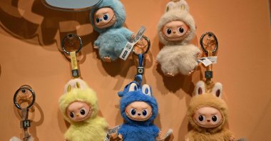 Newly-launched mini Labubu toys are displayed at a Pop Mart shop in Beijing, China, Aug. 29, 2025. (AFP Photo)