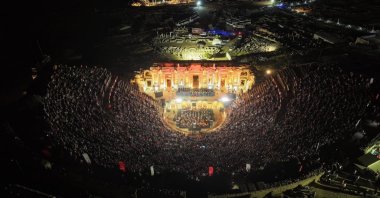 Audiences watch the "Carmina Burana" ballet at the 1st Denizli Opera and Ballet Days, Denizli, southwestern Türkiye, Sept. 3, 2025. (AA Photo)